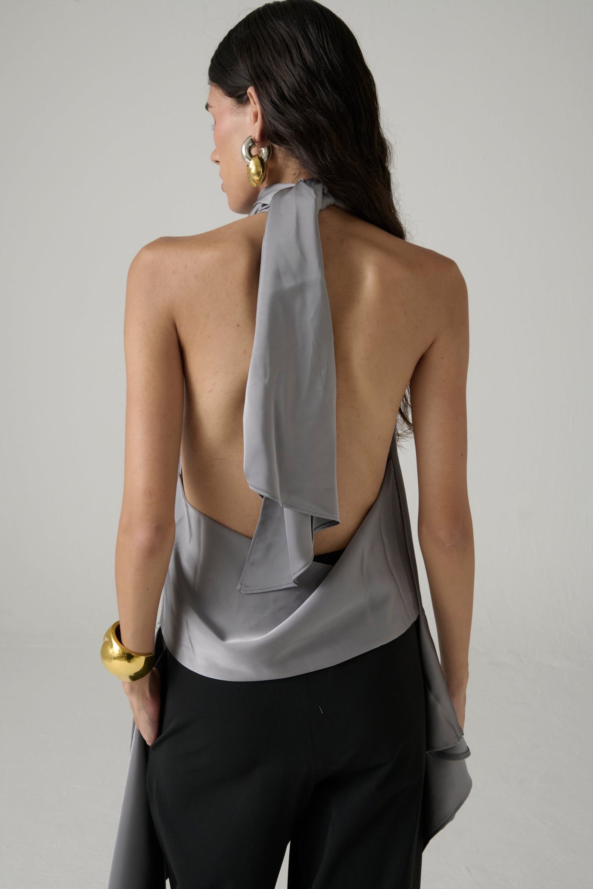 Blusa halter La Joyita en azul petróleo