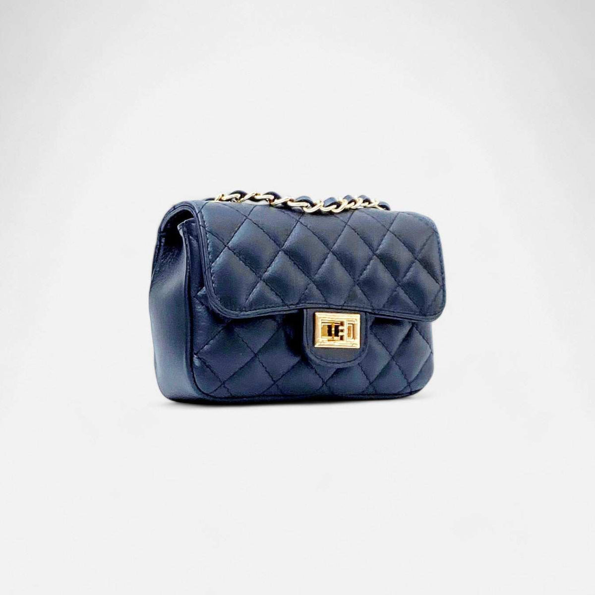 Bolso mini bandolera acolchado negro con cadena y piel