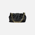 Bolso Pouch Elegance negro de piel con cadena dorada
