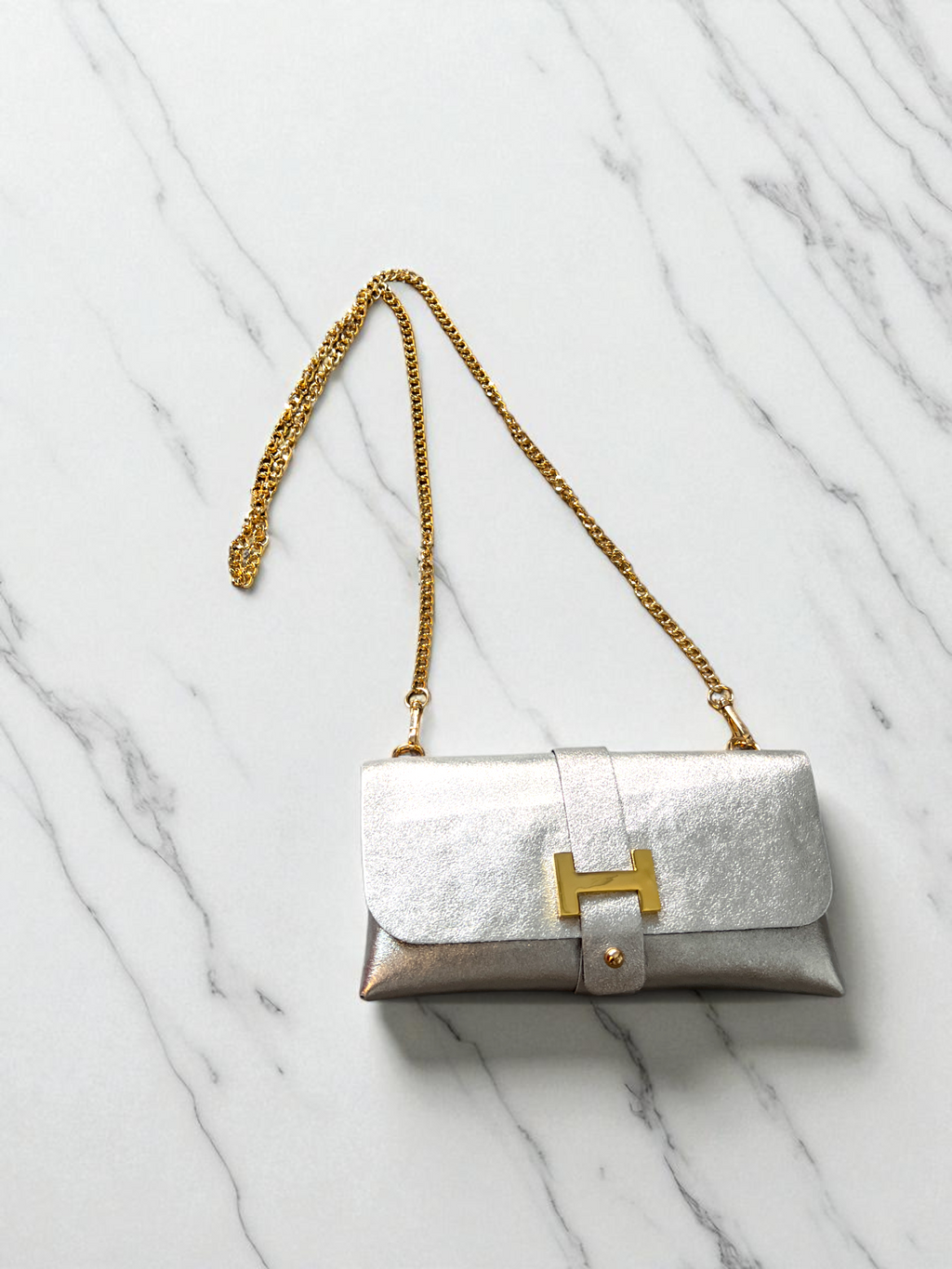 Bolso bandolera Nova metalizado con cadena dorada