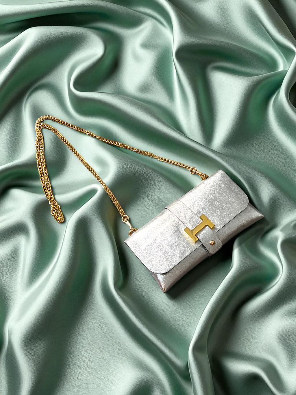 Bolso bandolera Nova metalizado con cadena dorada