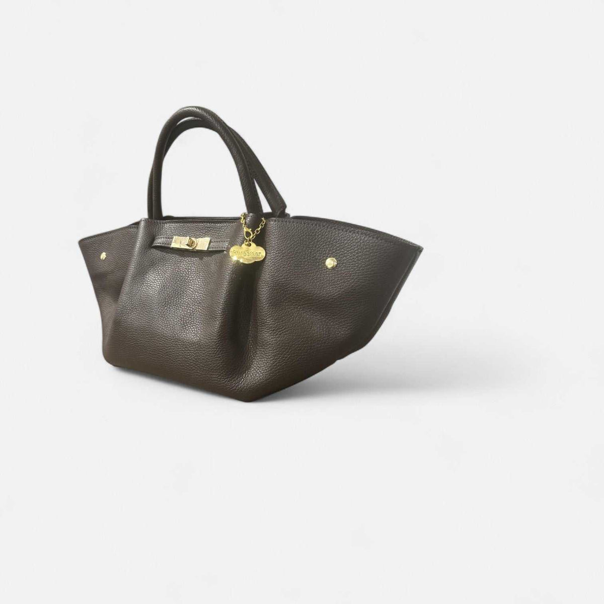 Bolso Cassandra chocolate de piel de vacuno con cierre giratorio