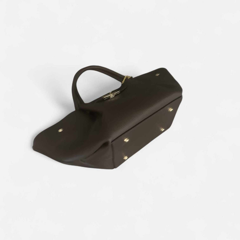 Bolso Cassandra chocolate de piel de vacuno con cierre giratorio