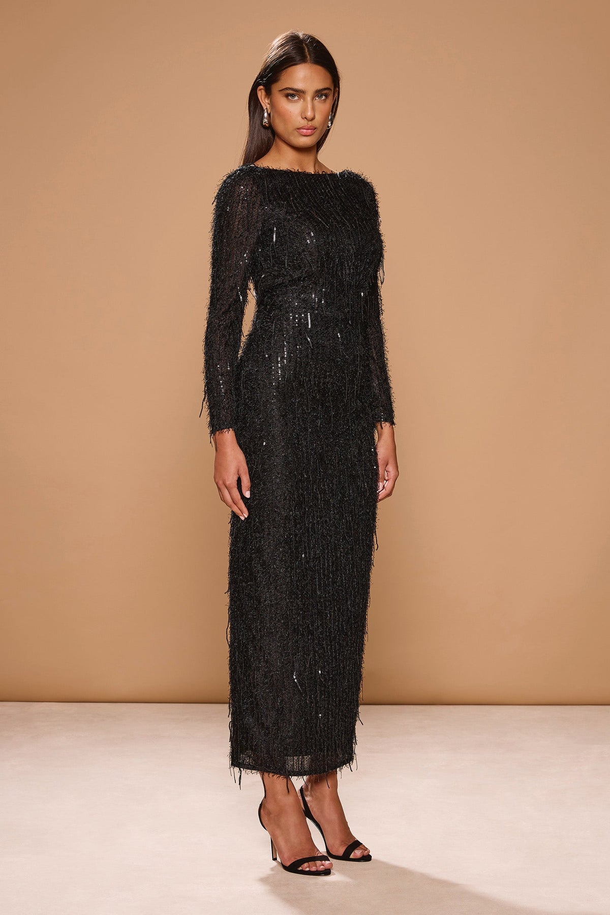 Vestido Sagara de punto brillante con espalda abierta