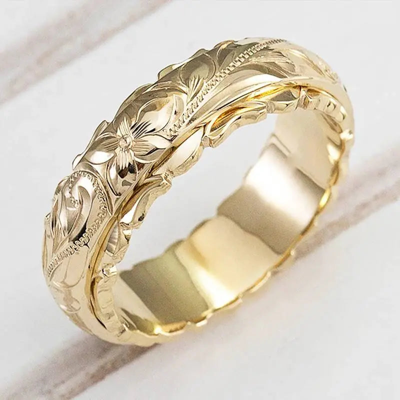 Katia | Anillo dorado con flor vintage
